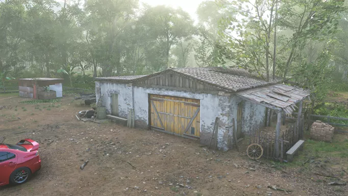 A barn in a misty jungle.
